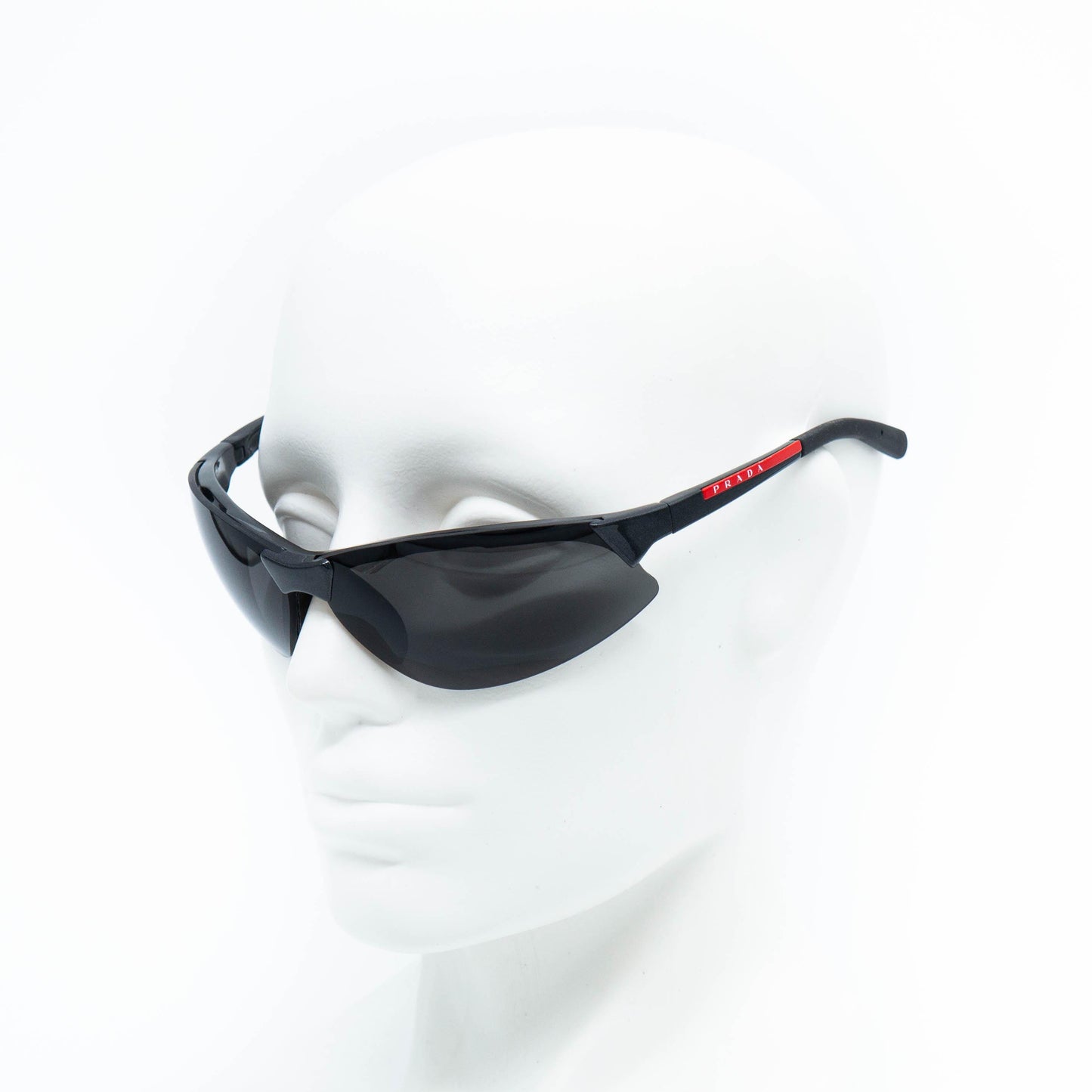 Prada SPS04A sport sunglasses on mannequin