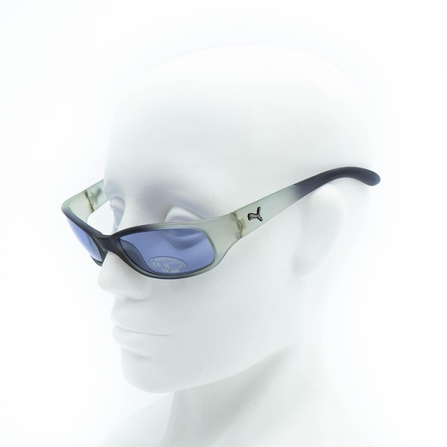 PUMA oval sunglasses on mannequin side view