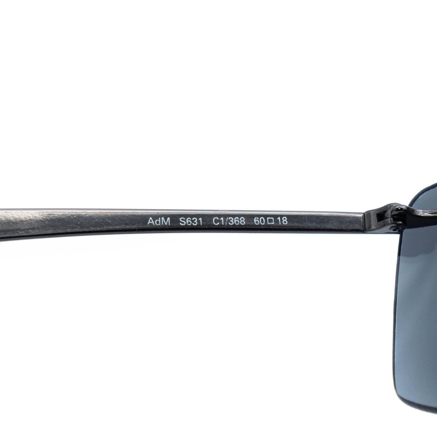 Close-up of temple and logo engraving