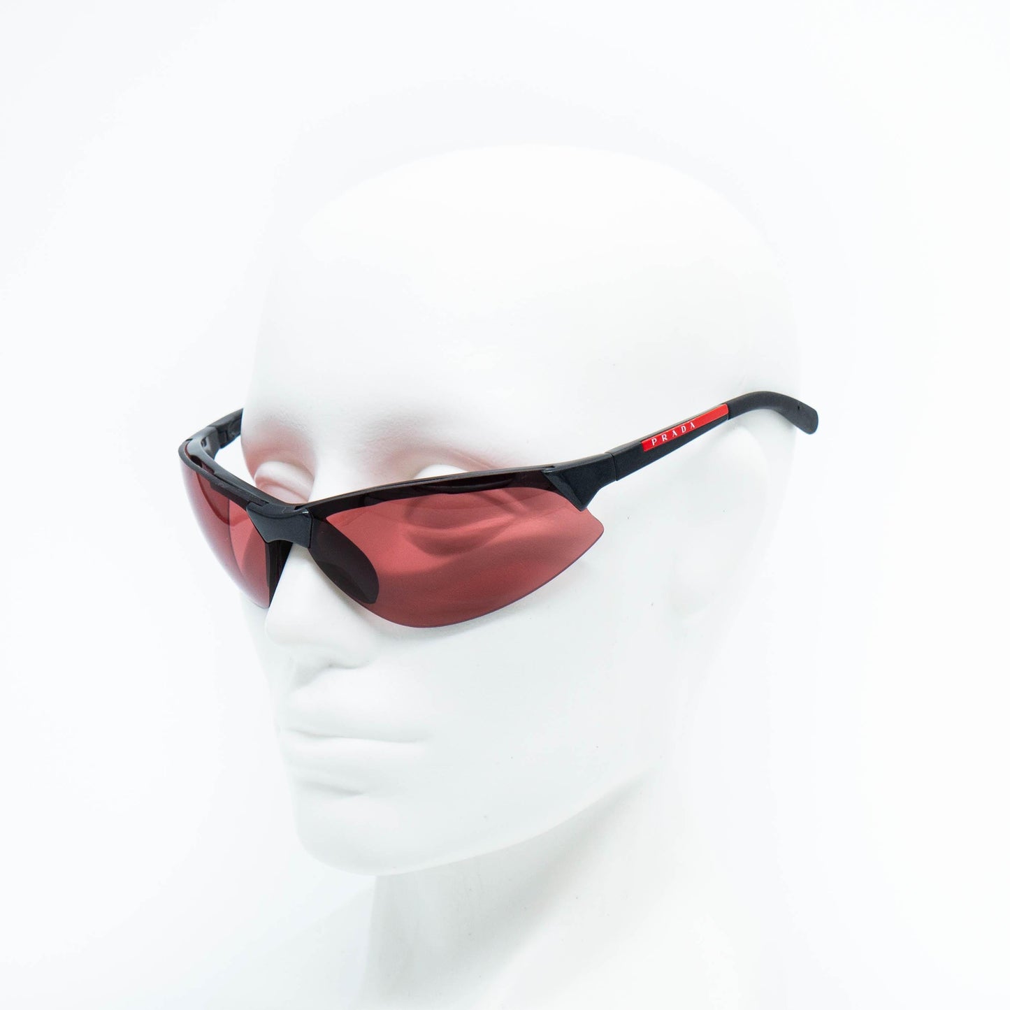 Prada SPS04A red sunglasses on mannequin