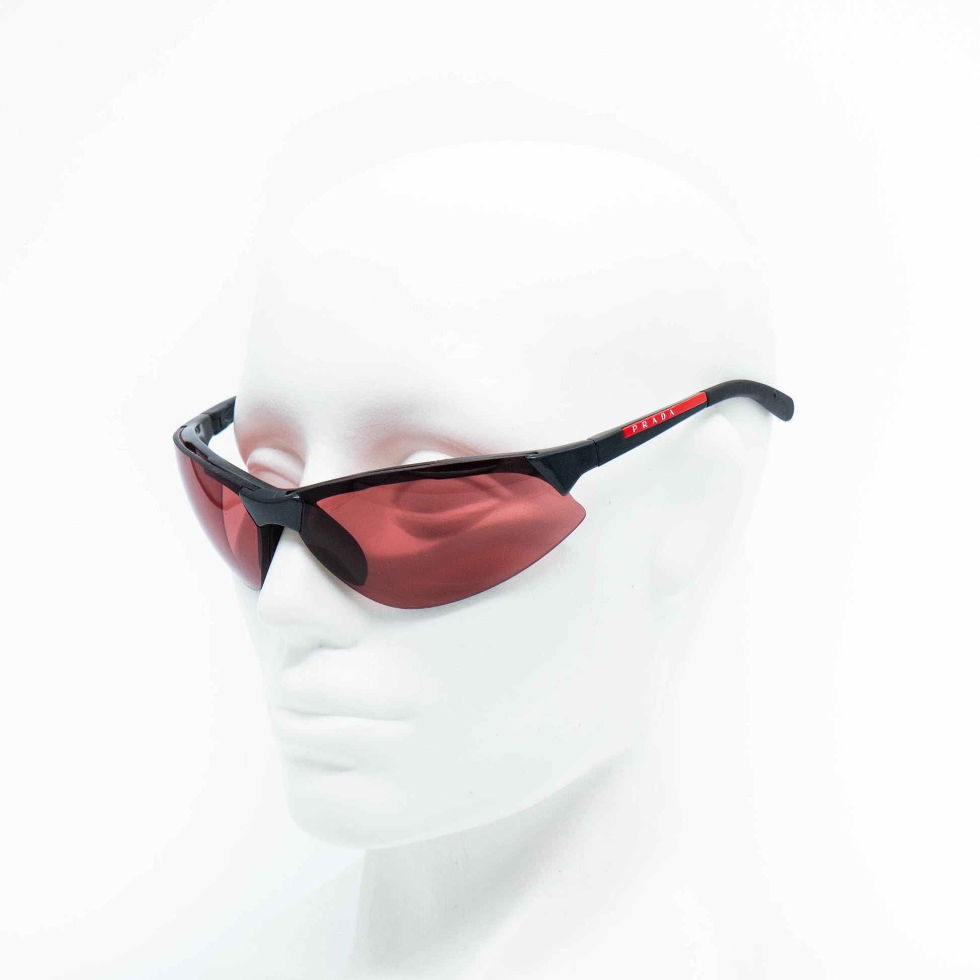 Prada SPS04A red sunglasses on mannequin