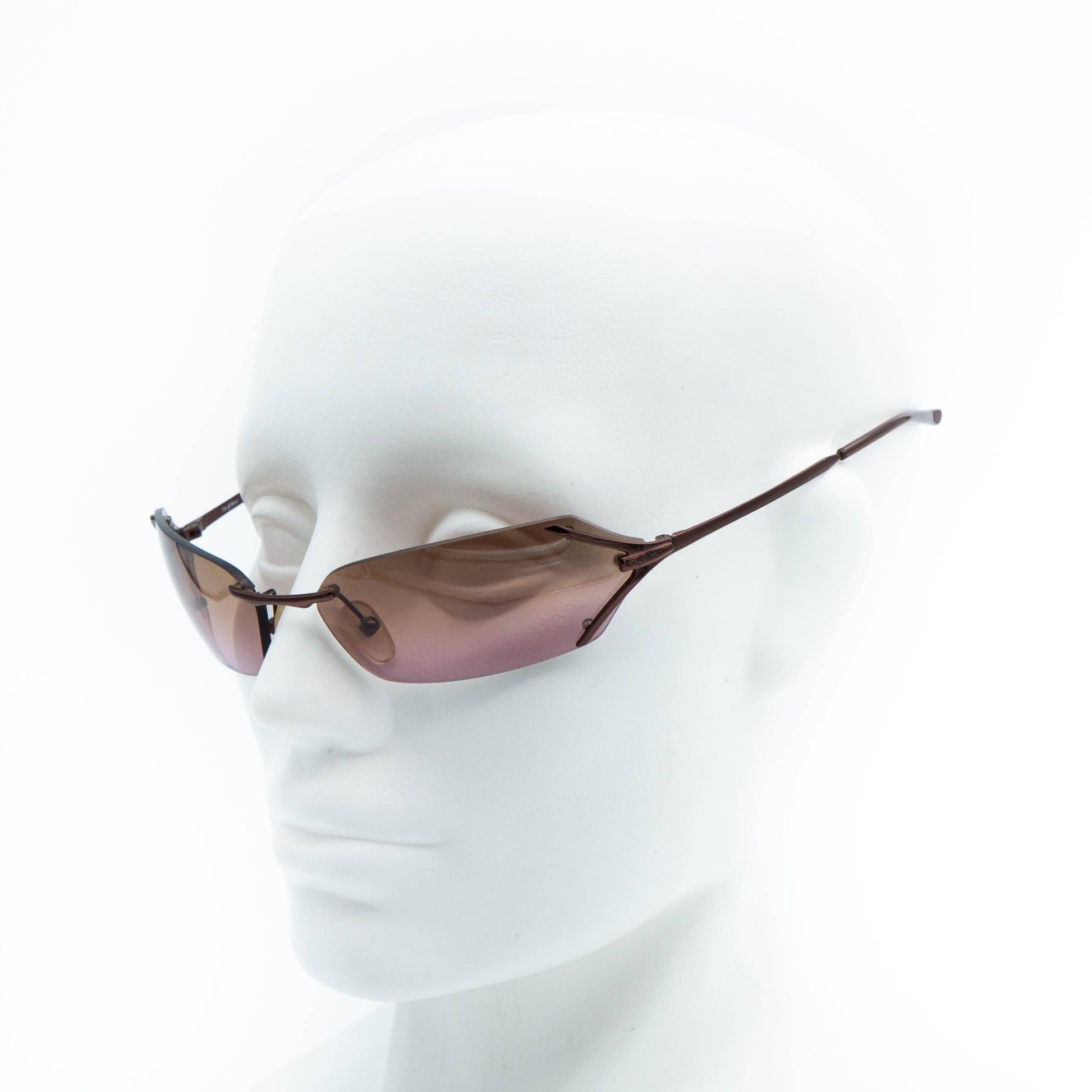 Byblos bronze brown sunglasses on mannequin