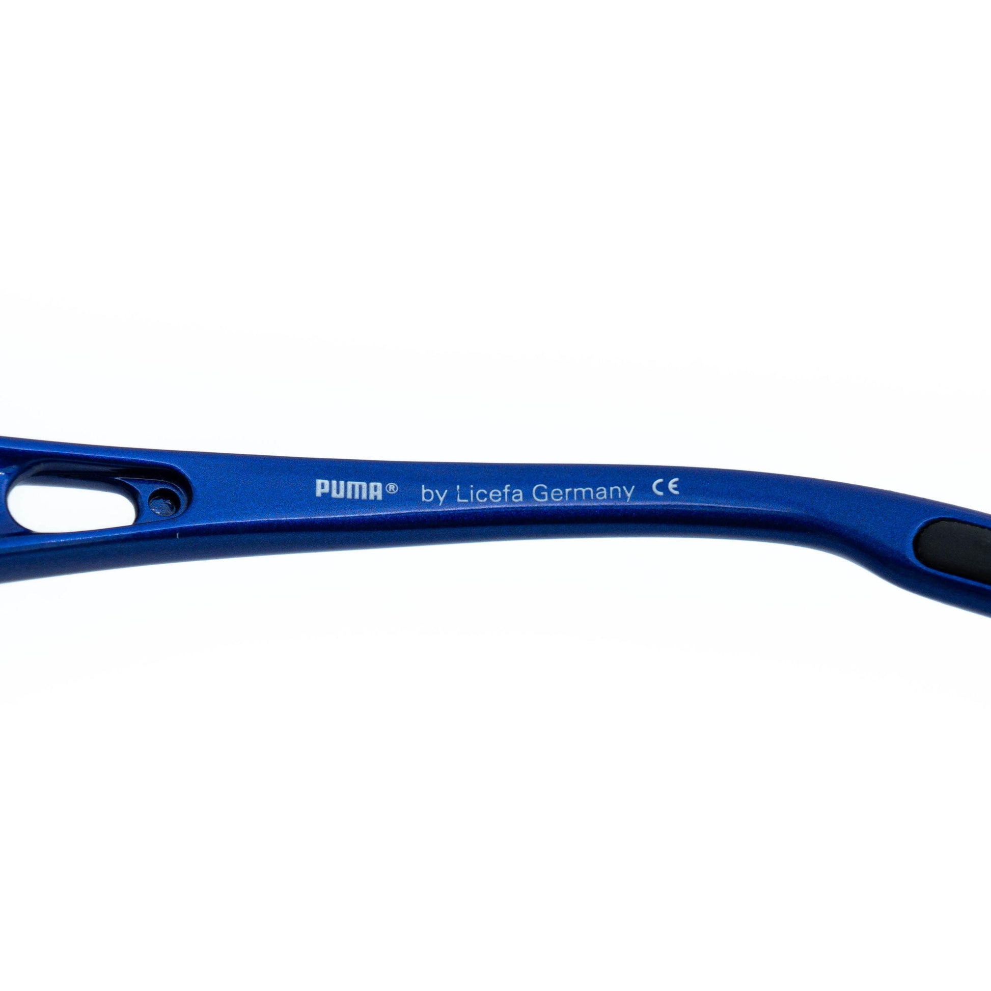 Puma Cyclone 2000s sport sunglasses temple close-up