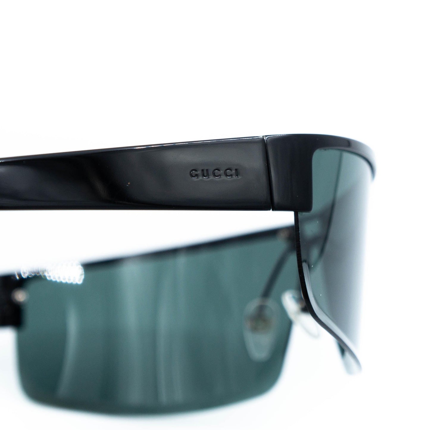 Gucci 1725S rimless sunglasses side view showing logo