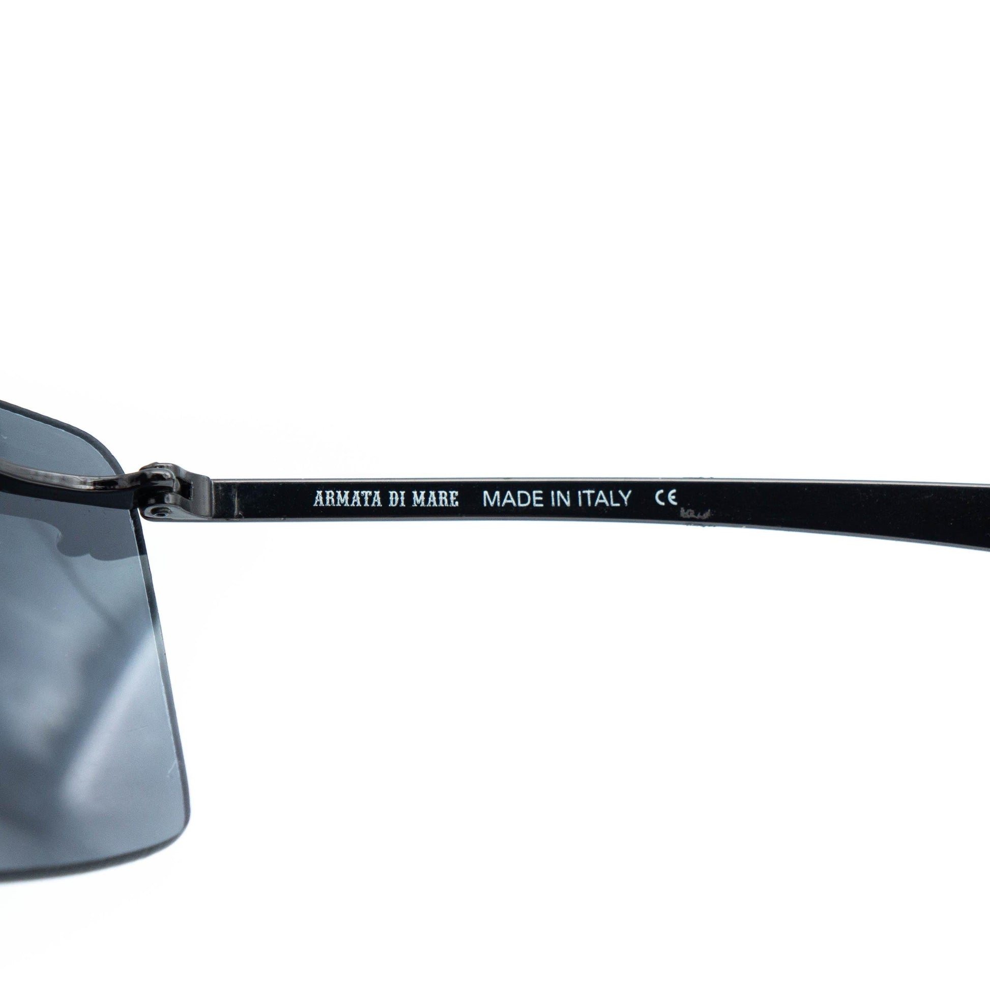 Close-up of temple and logo engraving