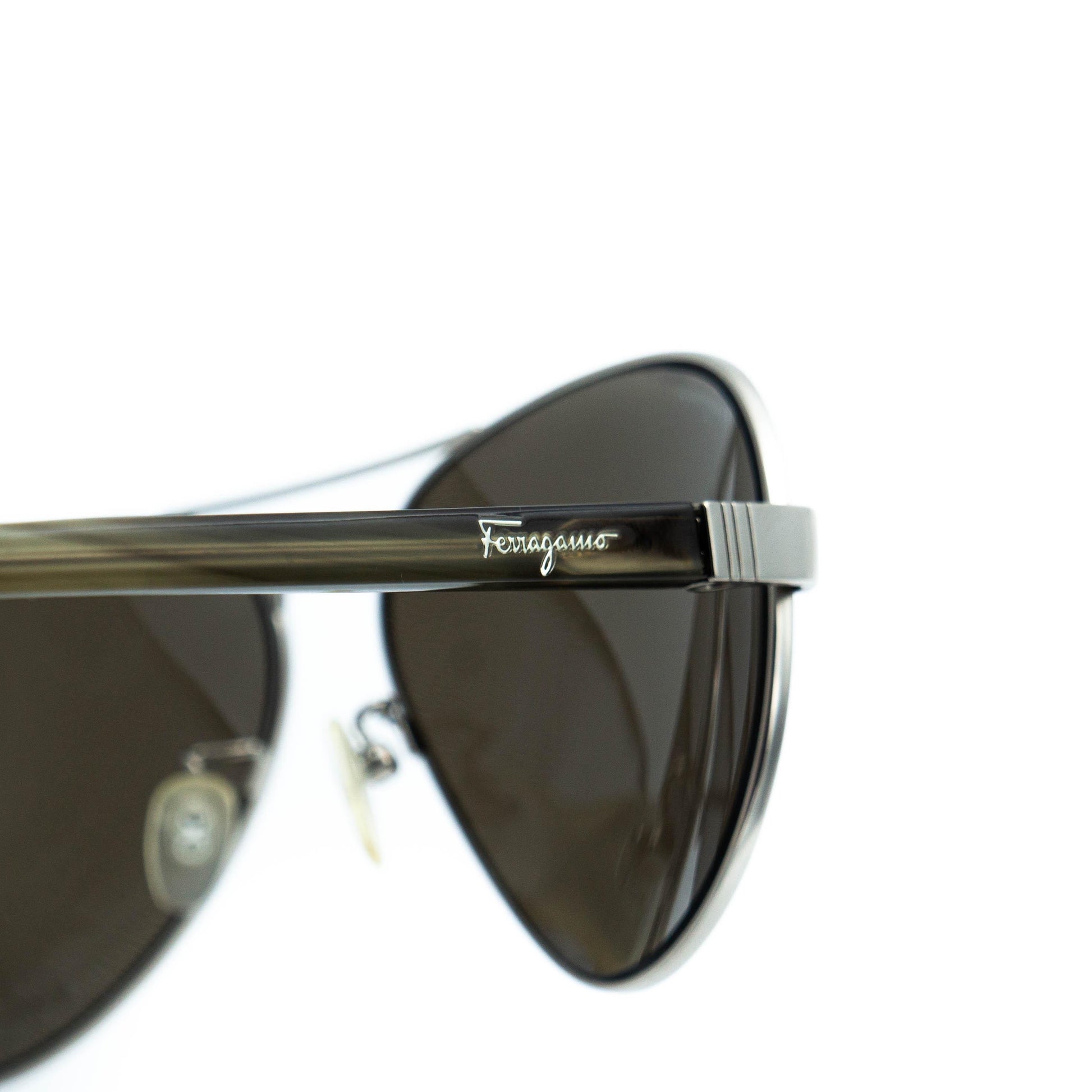 Close-up of Ferragamo logo on temple