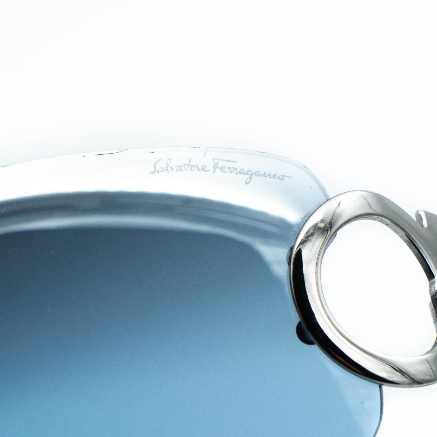 Temple detail showing Ferragamo logo and silver accent