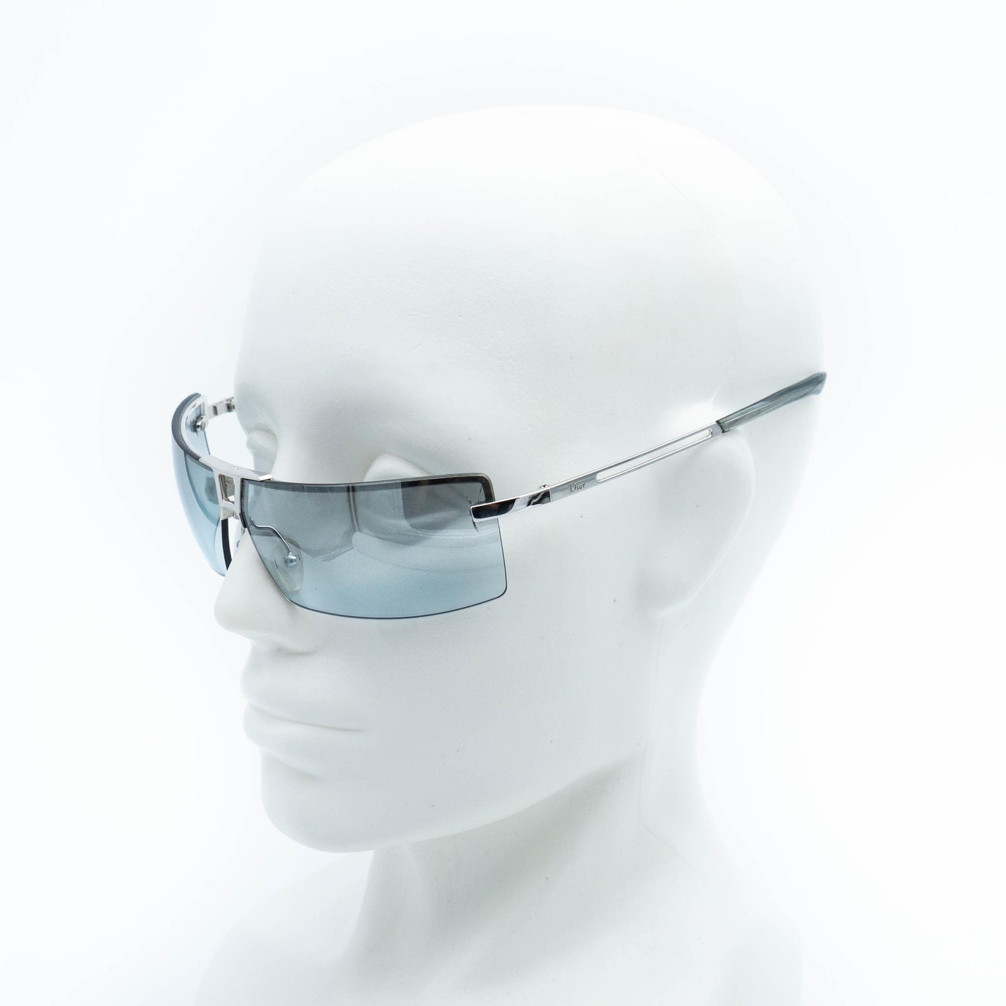 Dior blue gradient rimless sunglasses on mannequin