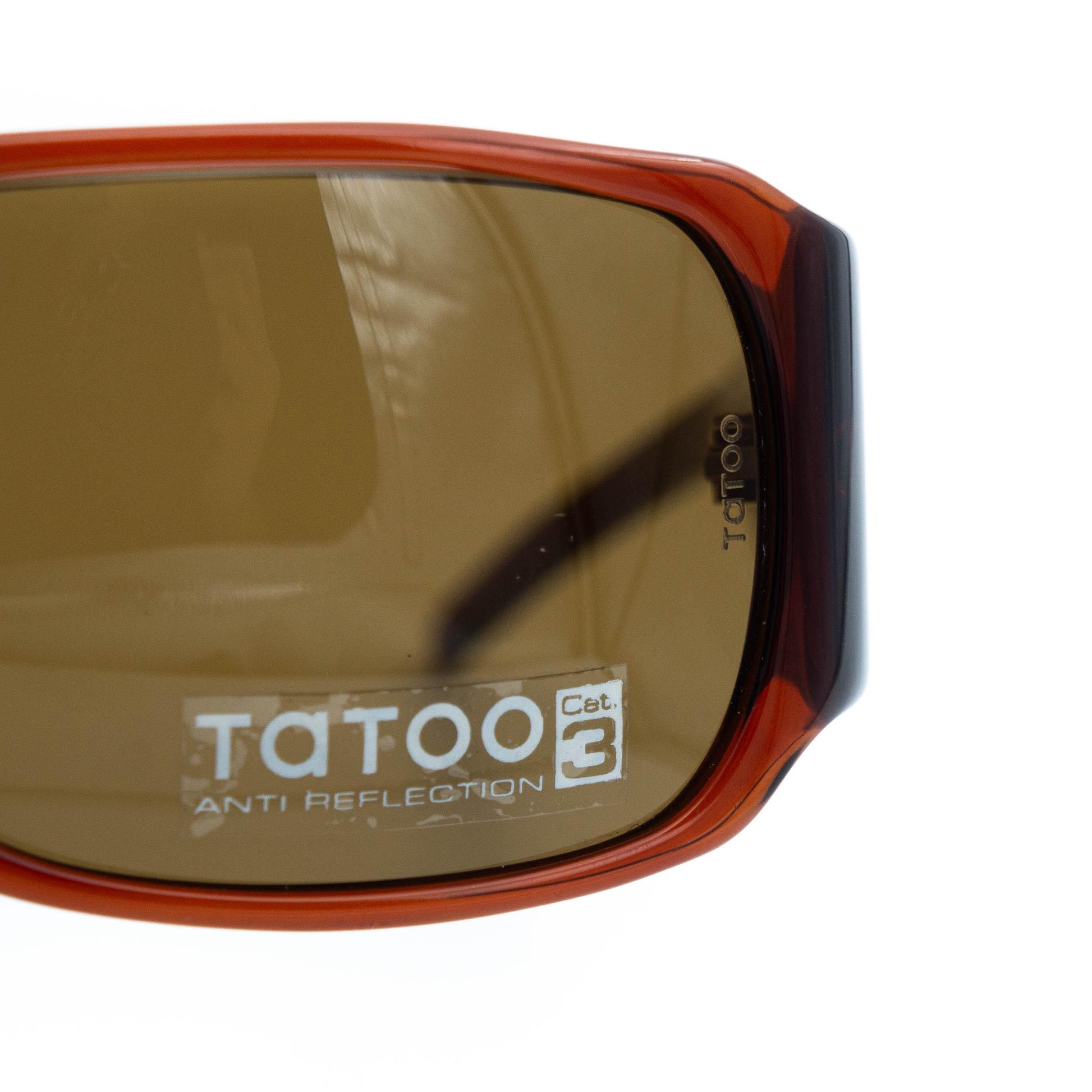 Brown gradient lenses detail with logo engraving