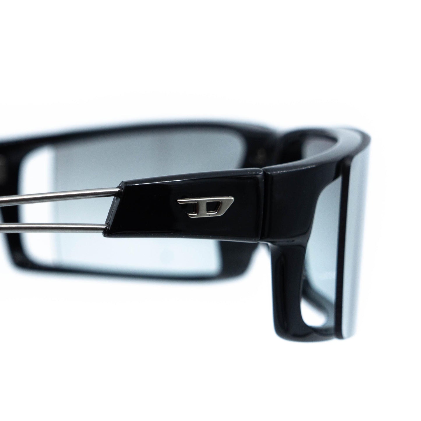 Close-up of Diesel logo on temple