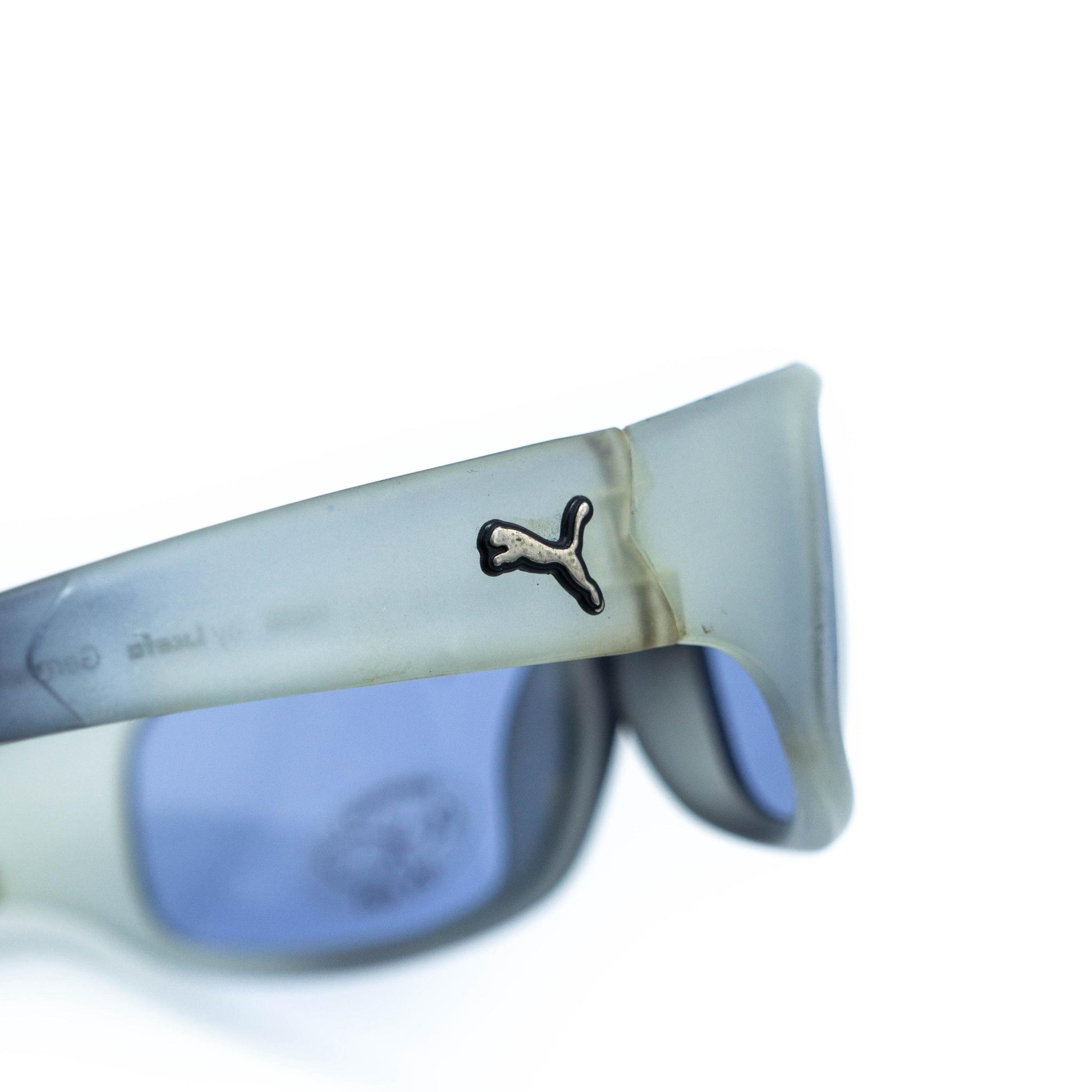 Temple detail with Puma logo close-up view