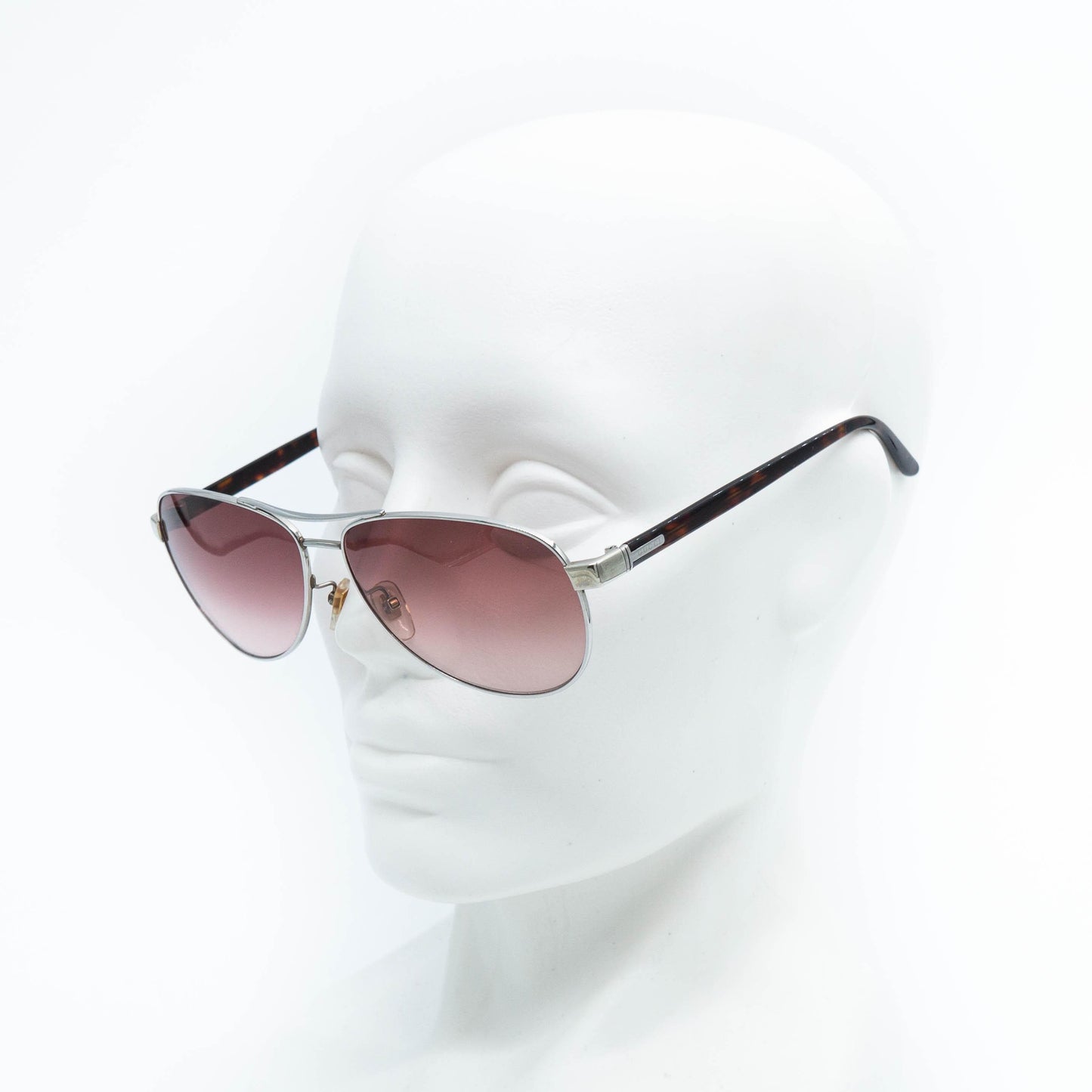 Gucci aviator sunglasses on mannequin